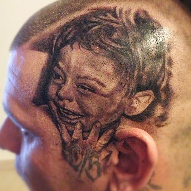Татуировка с головой ребенка
